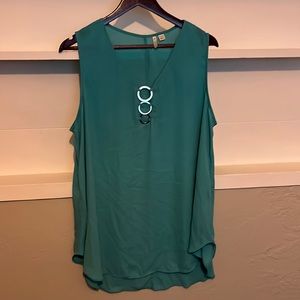 Green sleeveless blouse